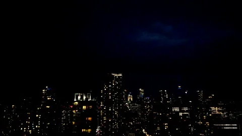 Dramatic lightning flashes over Toronto skyline during heavy night thunderstorm. Stock-Footage 347680361