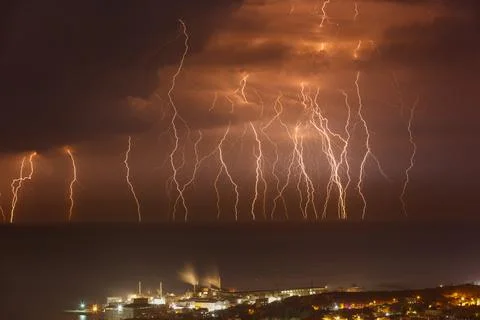 Dramatic Lightning over the Sea Stock Photos