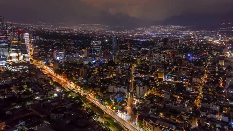 Dramatic Lightning Storm Over Bustling Mexico City, Aerial Night Hyperlapse Stock Footage