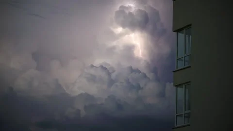 Dramatic Lightning Strike Among Dark Storm Clouds. Lightning flashes. Video stock 313402963