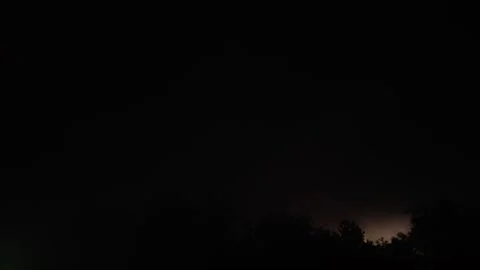 Dramatic lightning strike illuminating dark night sky during powerful thund.. Stock Footage 336149615