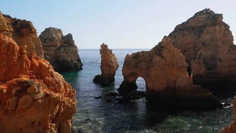 Dramatic Limestone Arches at Ponta da Piedade Algarve Portugal Stock Footage 310307696