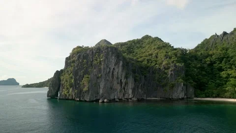 Dramatic Limestone Cliffs and Green Island – El Nido Palawan Stock Footage 320947159