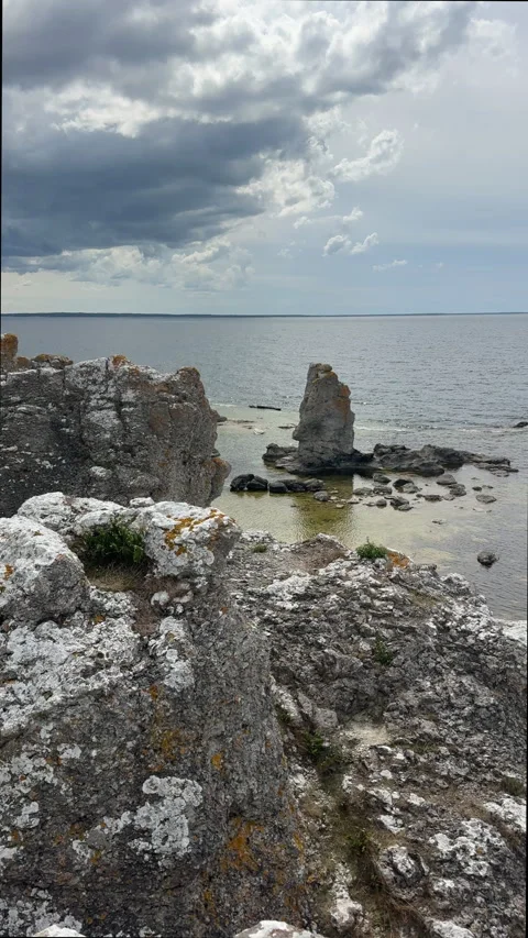 Dramatic Limestone Rauk and Storm Clouds Baltic Sea Gotland Stock Footage 344602338