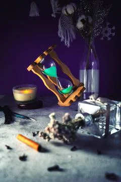 Dramatic lit image of hourglass, time concept Stock Photos