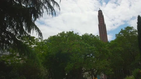 Dramatic Looking Up Shot On Bell Tower Of Church Sainte-Odile in Paris Stock Footage 156950114