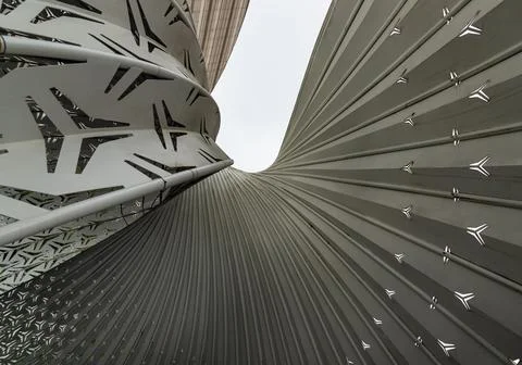 A dramatic low angle, this architectural detail highlights a futuristic dia.. Stock Photos