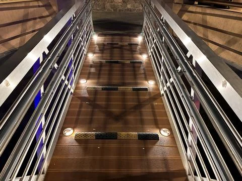 A dramatic low-angle architectural perspective looking straight up into a modern Stock Photos