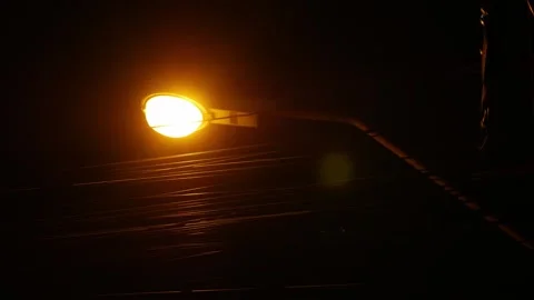 Dramatic low angle night view of tangled electric power cable Видео 336051659