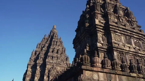 Dramatic low-angle perspective captures multiple Prambanan Temple towers ri.. Stock Footage 341545221