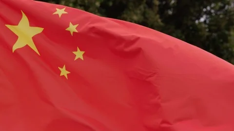 Dramatic low motion shot of real Chinese flag in wind. Stock Footage 87253902