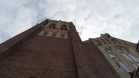 Dramatic Low Reveal Of St. Agatha Church And Bell Tower And Steeple Stock Footage 106466195