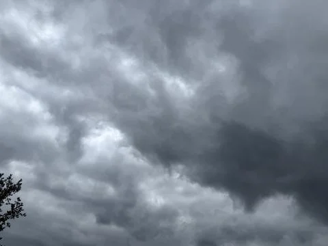 Dramatic Low Storm Clouds Across Gray Sky Stock Photos