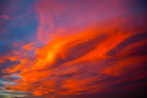 Dramatic majestic clouds at sunset or sunrise Stock Photos