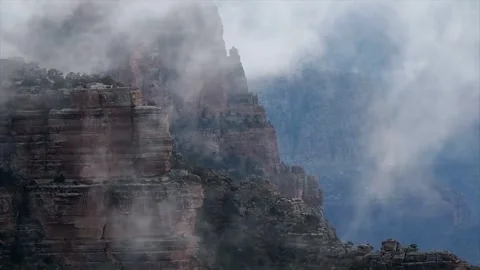 Dramatic Misty Canyon Peaks Under Rolling Clouds Stock Footage 323298187