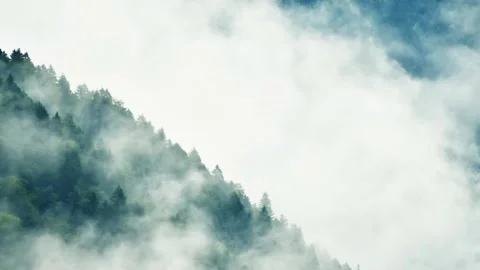 Dramatic misty mountains time-lapse outdoors with revealing white copy backgr Stock Footage 164929722