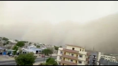 Dramatic moment powerful dust storm sweeps over Indian city Stock Footage 106673146