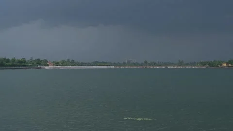 Dramatic Monsoon Sky Over Calm Lake Stock Footage 343377447