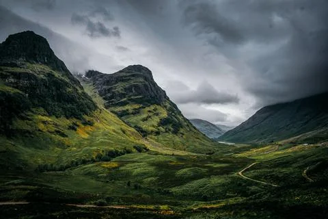 Dramatic, moody terrain of Glen Coe in the Scottish Highlands. Stock Photos