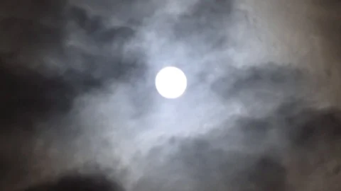 Dramatic moon on night sky. Moon between volume cumulus clouds. Werewolves time. Stock Footage 108023831