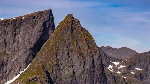 Dramatic Moss-Covered Mountain Peaks in Lofoten Norway Stock Photos
