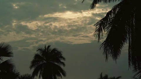 Dramatic motion blur timelapse of divine light rays piercing Senegalese clouds Stock Footage 309889028