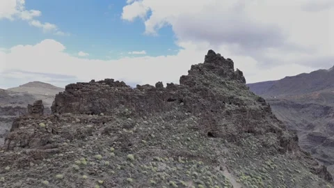 Dramatic Mountain with Ancient Cave Fort – Aerial Drone Shot on Gran Canaria Stock Footage 309880354