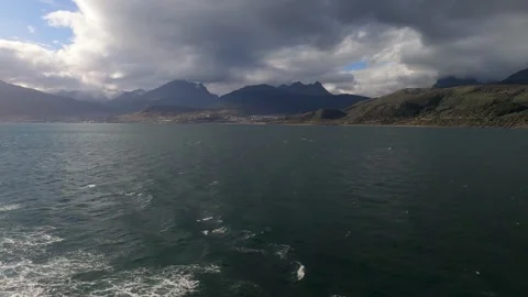 Dramatic mountain coastline of Tierra del Fuego under storm clouds, Argentina 動画素材 335275415