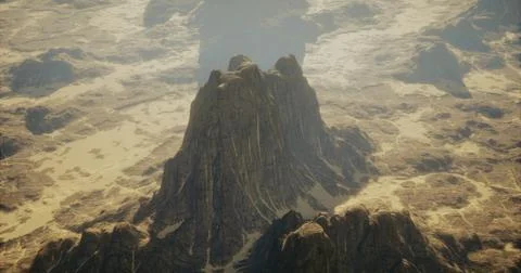 Dramatic mountain formation rising above a vast desert landscape under sunlig Illustrazione stock