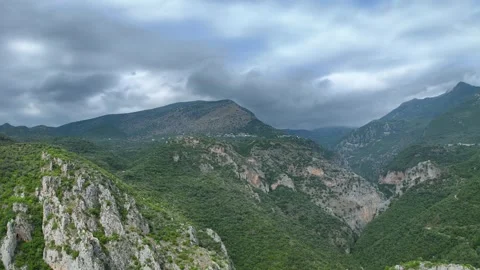 Dramatic Mountain Gorge and Storm Clouds in Mani, Greece Stock Footage 335645169