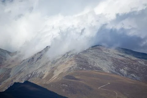 Dramatic Mountain Landscape with Clouds Stock Photos