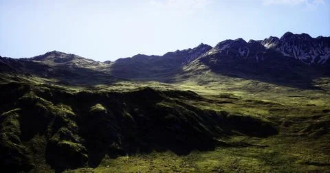 Dramatic mountain landscape with lush greenery and bright sky at midday Stock Illustration