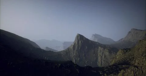 Dramatic mountain landscape with misty valleys and distant peaks at dusk Stock Illustration