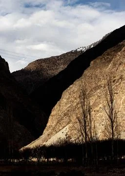 Dramatic Mountain Landscape with Shadows and Light Contrast Stock Photos