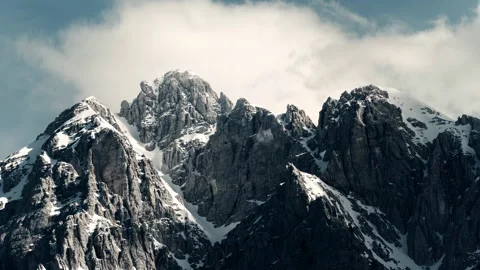Dramatic mountain landscape, showcasing rugged, snow-capped peaks. Stock Footage 297398489