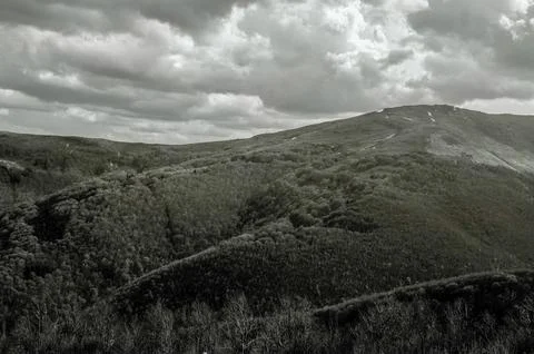Dramatic mountain landscape under cloudy sky Stock Photos