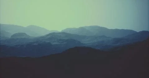 Dramatic mountain landscape under soft light at dusk Stock Illustration