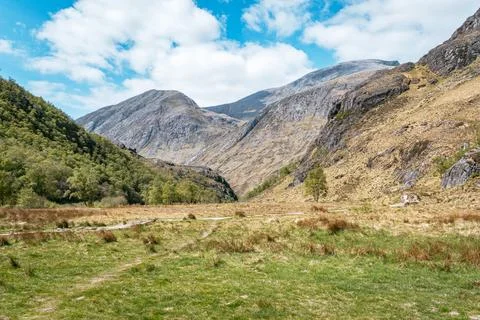 Dramatic mountain landscape in the wide open valley of Glen Nevis, Scotland Stock Photos