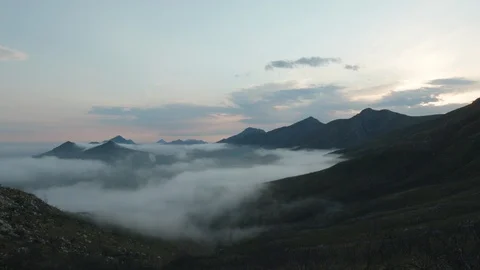 Dramatic Mountain Range with Clouds Stock Footage 124657542