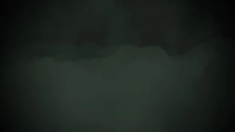 Dramatic mountain range emerges from a misty, atmospheric landscape Stock Footage 325769629