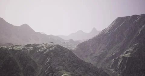 Dramatic mountain range features rugged peaks and rolling hills Stock-Illustration