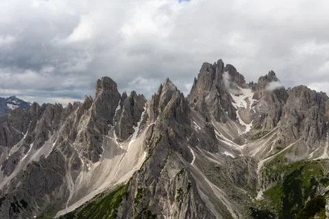 Dramatic mountain range with jagged peaks in the Dolomites Stock Photos