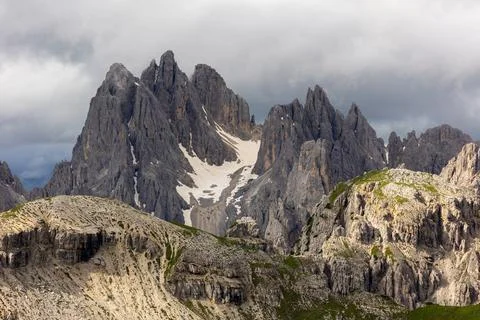 Dramatic mountain range with jagged peaks in the Dolomites Photos