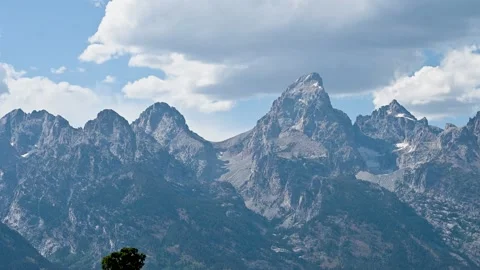 A dramatic mountain range with rugged pe... | Stock Video | Pond5