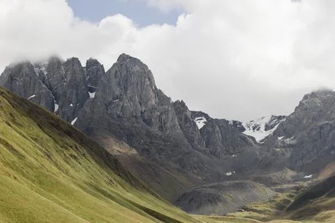 A dramatic mountain range with towering rocky peaks in Georgia Stock Photos