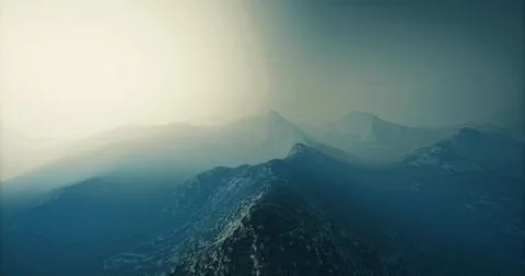 Dramatic mountain range under a hazy sky at dawn revealing scenic landscapes Stock Illustration