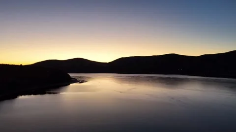 Dramatic Mountain Silhouette and Lake│Magic Hour Footage Stock-Footage 329062969