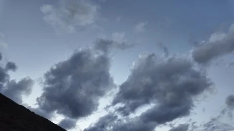 Dramatic Mountain Summit Very Dark Clouds with Sky at the Top  Stock Footage 286421531