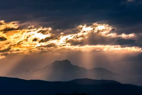 Dramatic mountain sunset with Long's Peak in Colorado Stock Photos