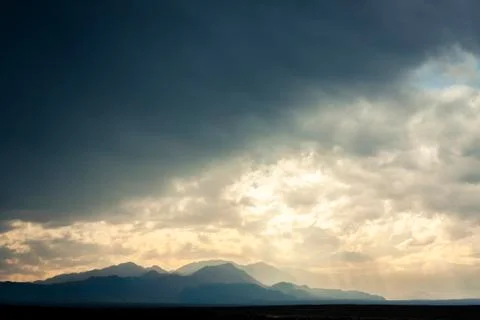 Dramatic mountain sunset Stock Photos